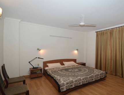 Furnished living area at Alcove Service Apartments in Pune